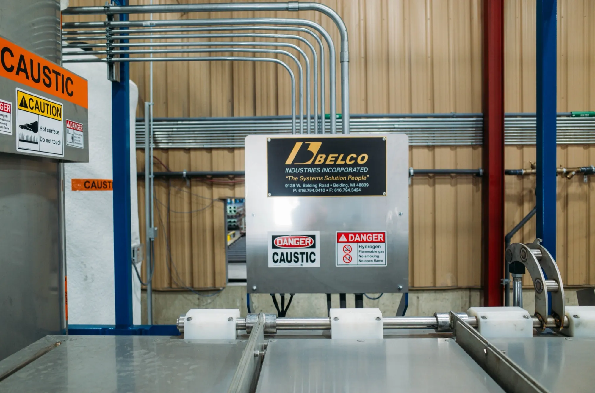 Belco die cleaning tanks with integrated die support bars and the Belco Industries nameplate.