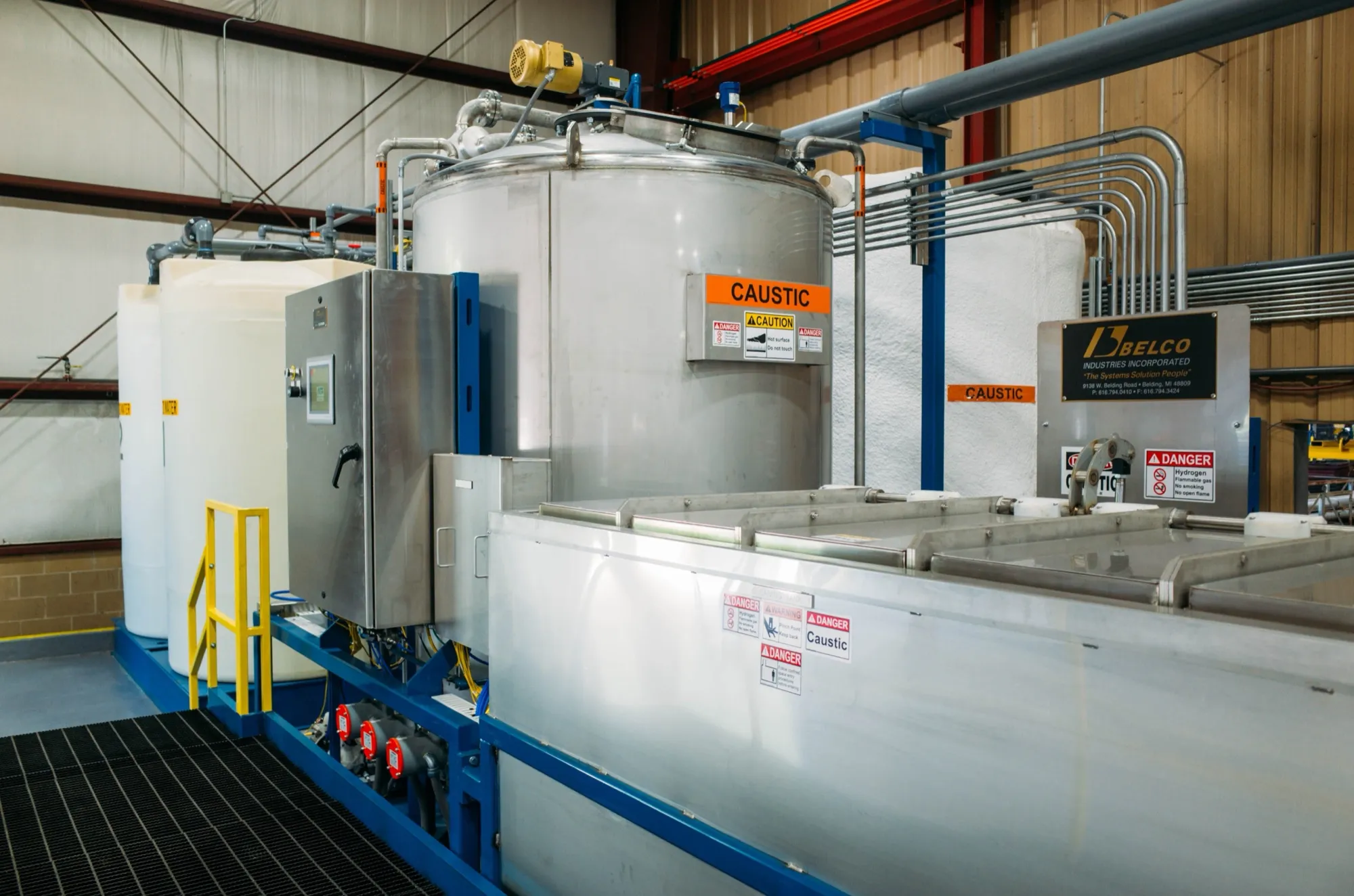 A complete Belco Automatic Die Cleaning System: 1,500-gallon stainless mix tank, control panel, and independent cleaning tanks.