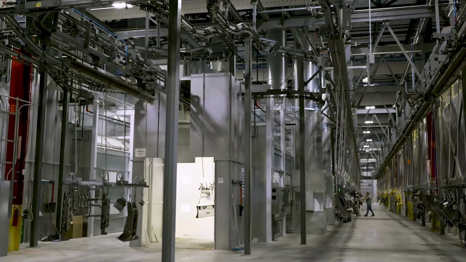 A Belco-built finishing line running the length of a customer plant.